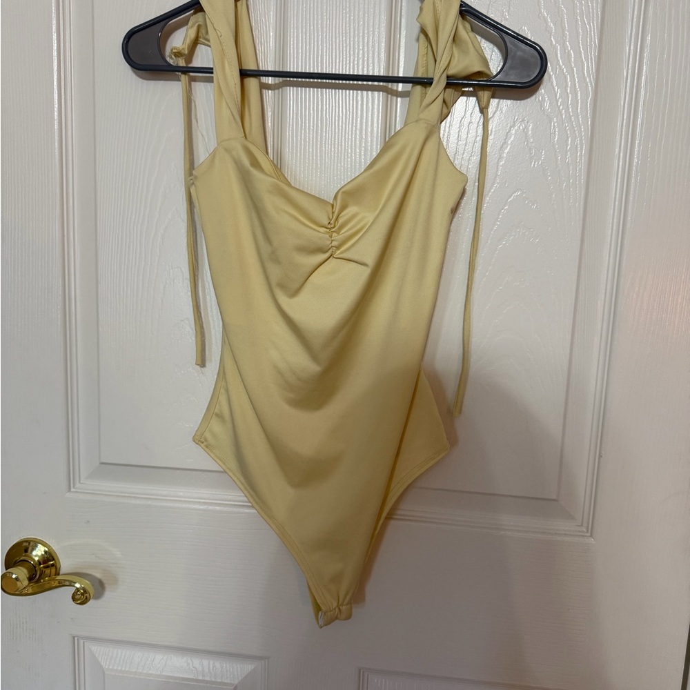 Yellow One-Piece Bodysuit